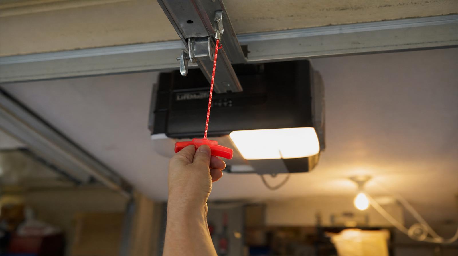 Garage door opener carriage with red emergency release cord